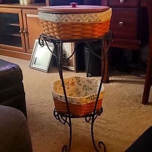 Longaberger  wrought iron stand with 2 Lonaberger  baskets bottom.